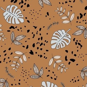 Jungle leaves and cheetah spots tropical monstera branches and botanical plants natural earthy boho theme nursery freehand gray neutral beige on burnt orange