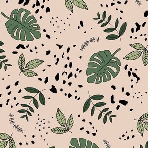 Jungle leaves and cheetah spots tropical monstera branches and botanical plants natural earthy boho theme nursery freehand green on beige 