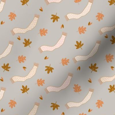 Tiny Autumn Leaves and Scarf in the Wind on gray