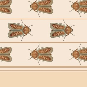 Moth parade on teatowel