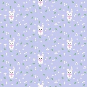 Tiny white fluffy bunnies and blossoms on lilac 