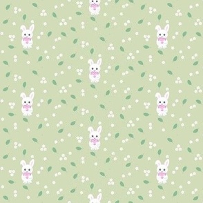 Tiny bunnies and blossoms on gre