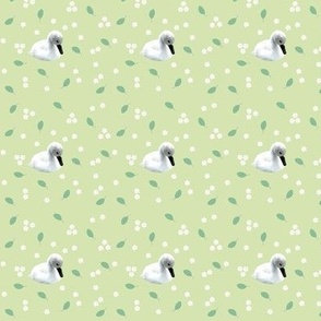 Tiny swans and blossoms green 