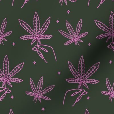 hands holding cannabis - pink + dark green