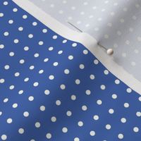 White on royal blue eighth inch polka dot