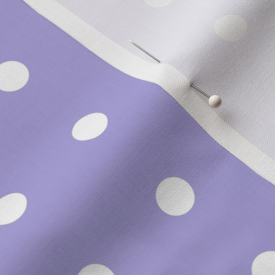 Regular white polka dot print on lilac