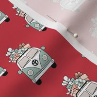 Happy holidays colorful Christmas camper van hippie bus with presents driving home for Christmas vintage mint green ruby red