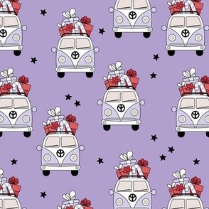 Happy holidays colorful Christmas camper van hippie bus with presents driving home for Christmas vintage starry night lilac purple red