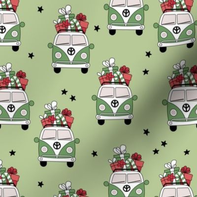 Happy holidays colorful Christmas camper van hippie bus with presents driving home for Christmas vintage starry night mint green red on matcha