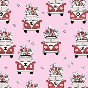 Happy holidays colorful Christmas camper van hippie bus with presents driving home for Christmas vintage starry night ruby red pink