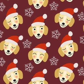 Cute Dachshund dog in Santa Claus Christmas cap snowflakes