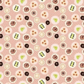 Mini Swedish Fika Pastries Princess Cake Cinnamon Bun Chocolate Balls on a Polka Dot Blush Pink Background