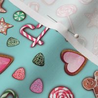 Ditsy candy and gingerbread on white with gingerbread cookies and candy cane hearts, peppermints and lollipops, hearts, stars and Christmas trees