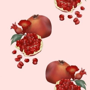 Juicy pomegranate on a pink  background