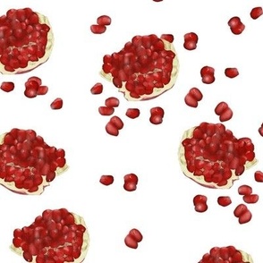 Juicy pomegranate on a white background