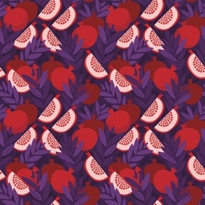 Pomegranates fruits on purple