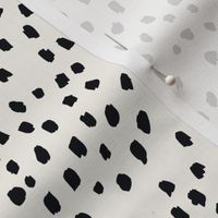 Black Abstract Speckle Marks on Bone