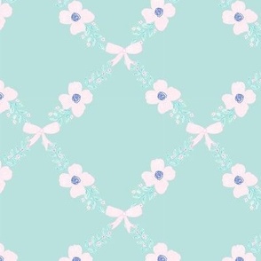 A hand illustrated  ribbon bow and floral leaves on mint