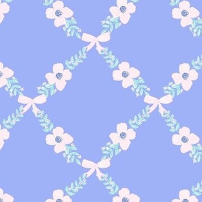 A hand illustrated  ribbon bow and floral leaves on blue