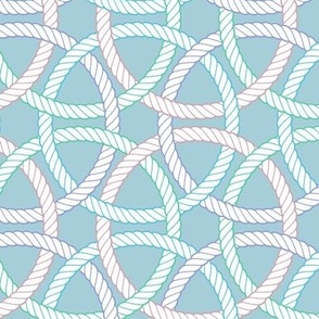 large pastel interlocking rope rings on light blue