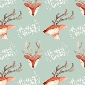 watercolor reindeer heads / small / cute reindeer on pastel green with white words merry and bright