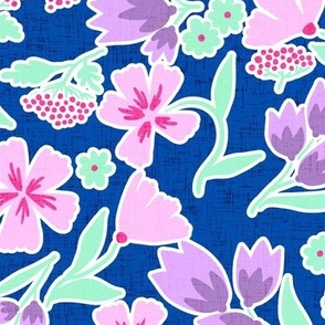 Sweet ditsy pastel florals on electric blue with linen texture NON DIRECTIONAL Large scale