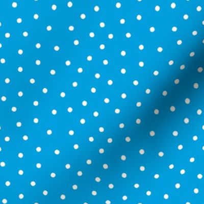 Scattered Polka Dots on Blue