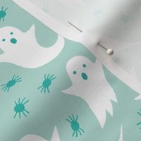 Halloween ghosts on pastel mint