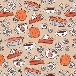 Cutesie Thanksgiving - hot chocolate and pumpkin pie autumn snacks with smileys and retro daisies vintage orange red on beige sand
