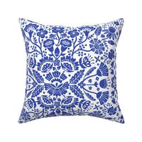 Symmetrical floral folk art pattern in indigo blue and white - middle scale