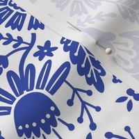 Symmetrical floral folk art pattern in indigo blue and white - middle scale