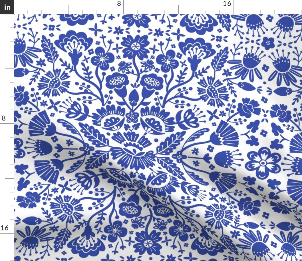 Symmetrical floral folk art pattern in indigo blue and white - middle scale