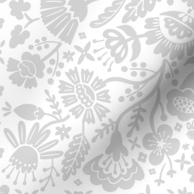 Symmetrical floral folk art pattern in grey and white - middle scale