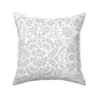 Symmetrical floral folk art pattern in grey and white - middle scale