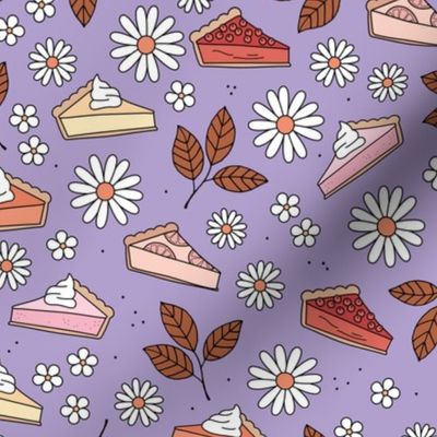 Pie lovers autumn - leaves flowers and fall food pumpkin pie cheesecake lemon pie and berries red pink orange on lilac purple