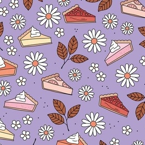 Pie lovers autumn - leaves flowers and fall food pumpkin pie cheesecake lemon pie and berries red pink orange on lilac purple