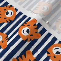 Tigers - cute tiger faces on navy stripes - LAD22