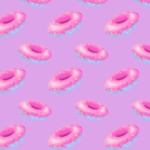 Pink and blue donuts on purple