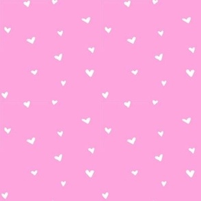 white hearts on pink