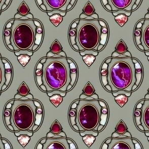 Rubies and Inlaid Metalwork on Smooth Grey Background