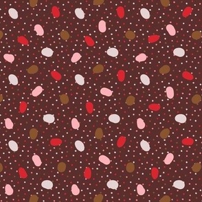 Ditsy xmas sweets on a dot background in chocolat, pink and white