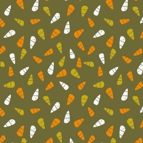 Candy Corns on a Green Background