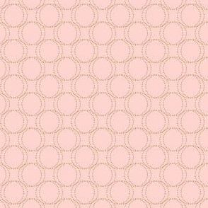 Geometric Dotted Oval Pattern in Gold on a Solid Light Pink Background  with 1 inch Repeat