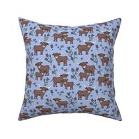 Sweet cutesy highland cows in a lush spring garden -  longhorn and thistles ranch design for kids wild animal design lilac violet green on periwinkle blue