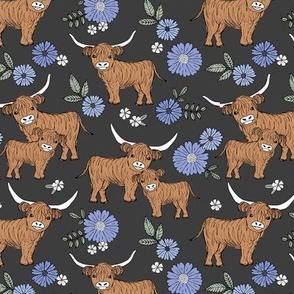 Cutesy highland cows blossom - adorable ranch animals cattle longhorn design with flowers and leaves wild garden design for kids lavender blue on charcoal