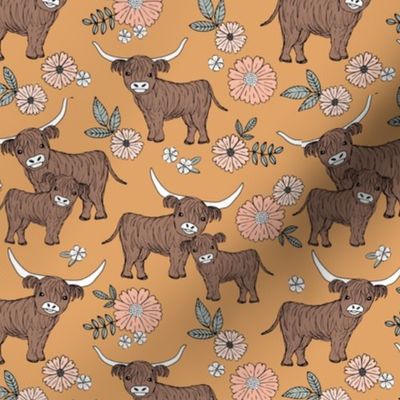 Cutesy highland cows blossom - adorable ranch animals cattle longhorn design with flowers and leaves wild garden design for kids blush peach on vintage orange