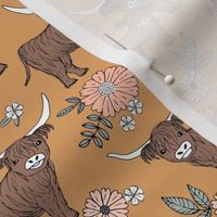 Cutesy highland cows blossom - adorable ranch animals cattle longhorn design with flowers and leaves wild garden design for kids blush peach on vintage orange