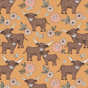 Cutesy highland cows blossom - adorable ranch animals cattle longhorn design with flowers and leaves wild garden design for kids blush peach on vintage orange