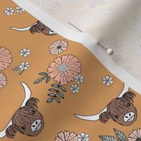 Cutesy highland cows and blossom - adorable ranch animals cattle longhorn vintage freehand flowers and leaves design for girls nursery vintage orange beige blush