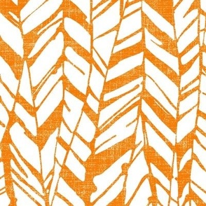 medium color graphic feather in orange on linen